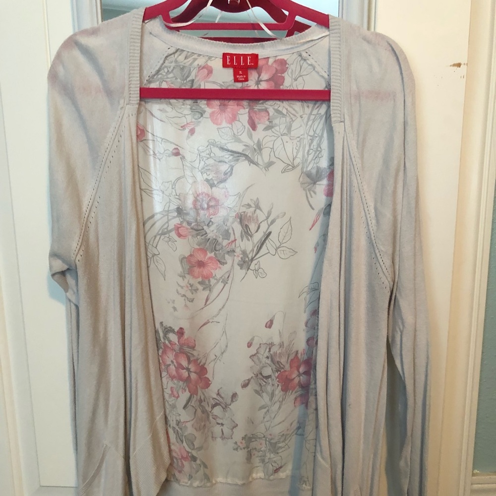 Adorable sweater with floral pattern on back